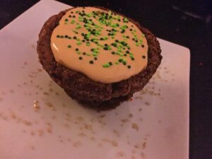 Pot O' Gold Guinness Brownie with Caramel Irish Whiskey mousse with green sprinkles