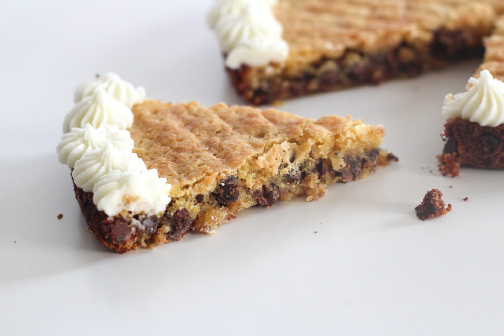 Slice of soft chocolately gluten free passover cookie cake with coconut flour.