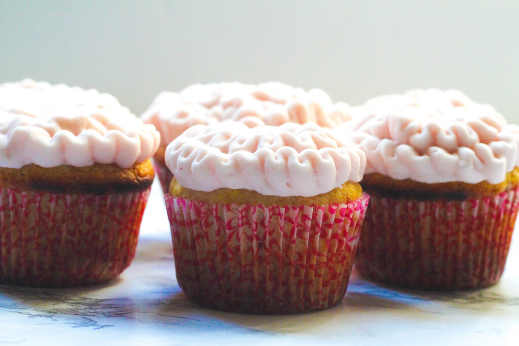 Kentucky Oaks Lily Cocktail Cupcakes in pink cupcake wrappers.