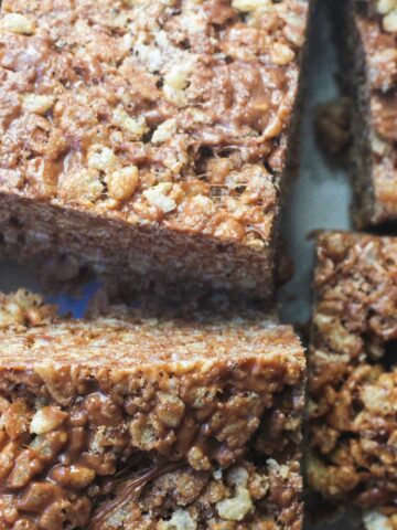 A top down close up view of Nutella Rice Krispie Treats cut into squares