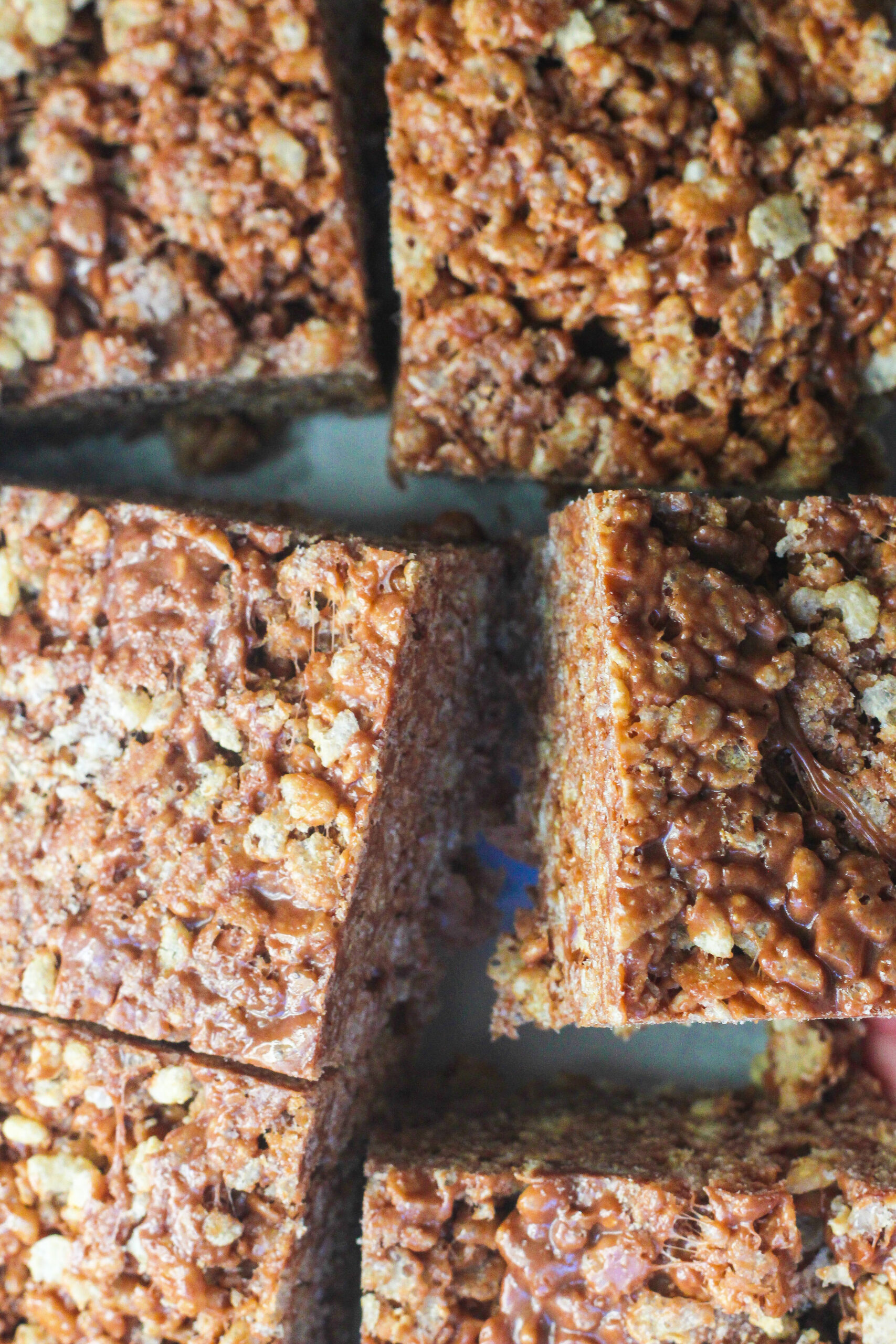 A top down close up view of Nutella Rice Krispie Treats cut into squares