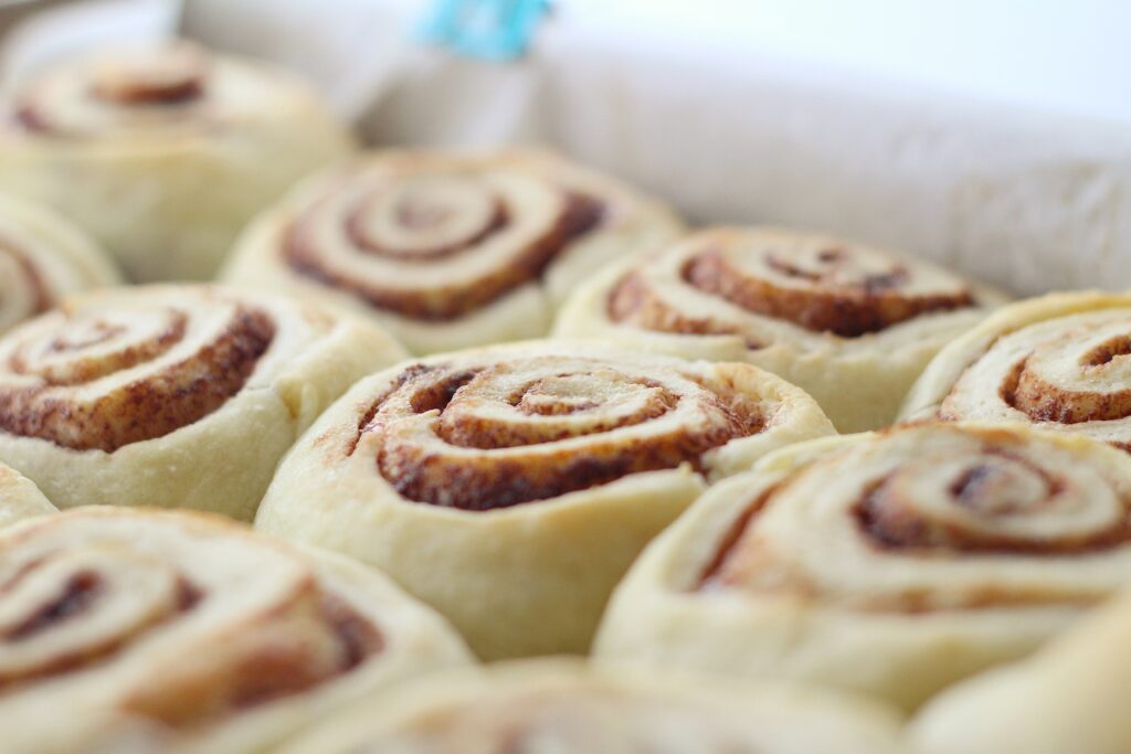 Angled view of baked hot cocoa rolls without frosting 