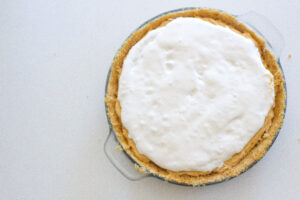 top down view of whole Fluffernutter Pie on the right side of the frame
