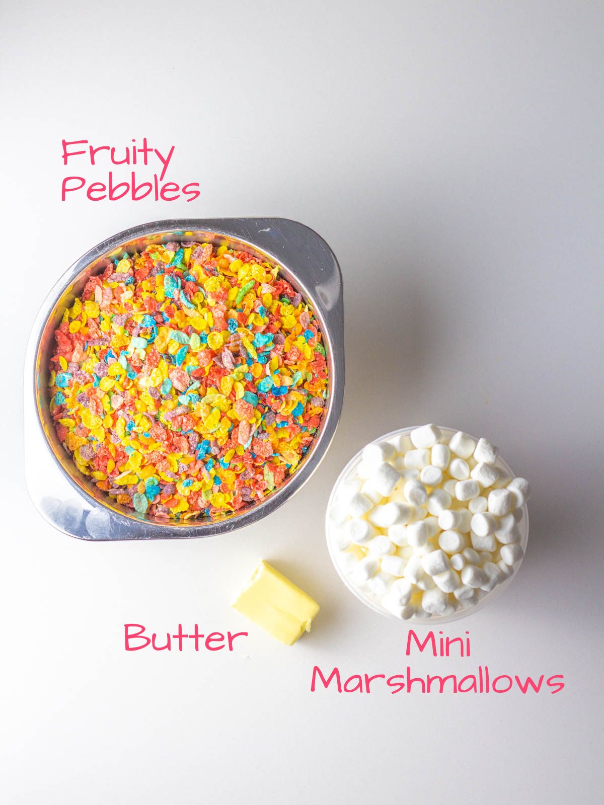 The three ingredients needed to make Fruity Pebbles Treats.