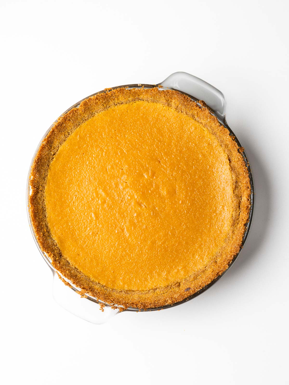 Baked sweet potato pie in a graham cracker crust.
